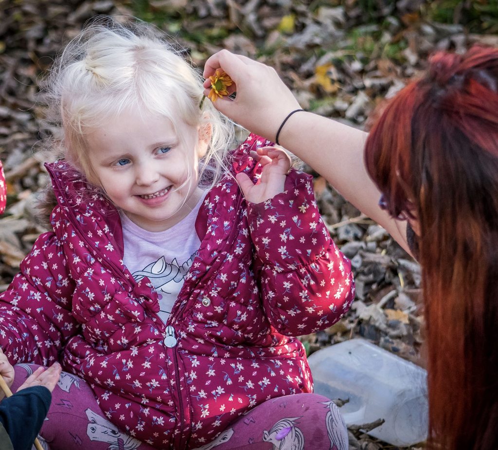 girl with flower in hair